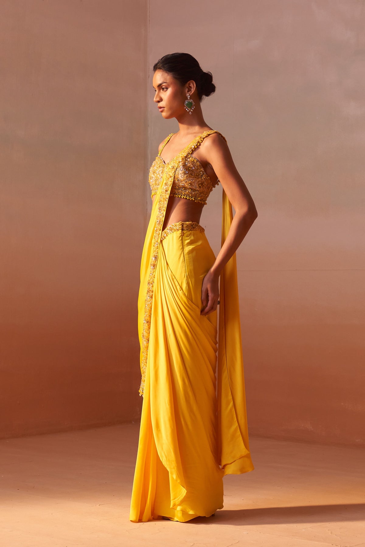 Yellow Draped Saree With Nude Choli