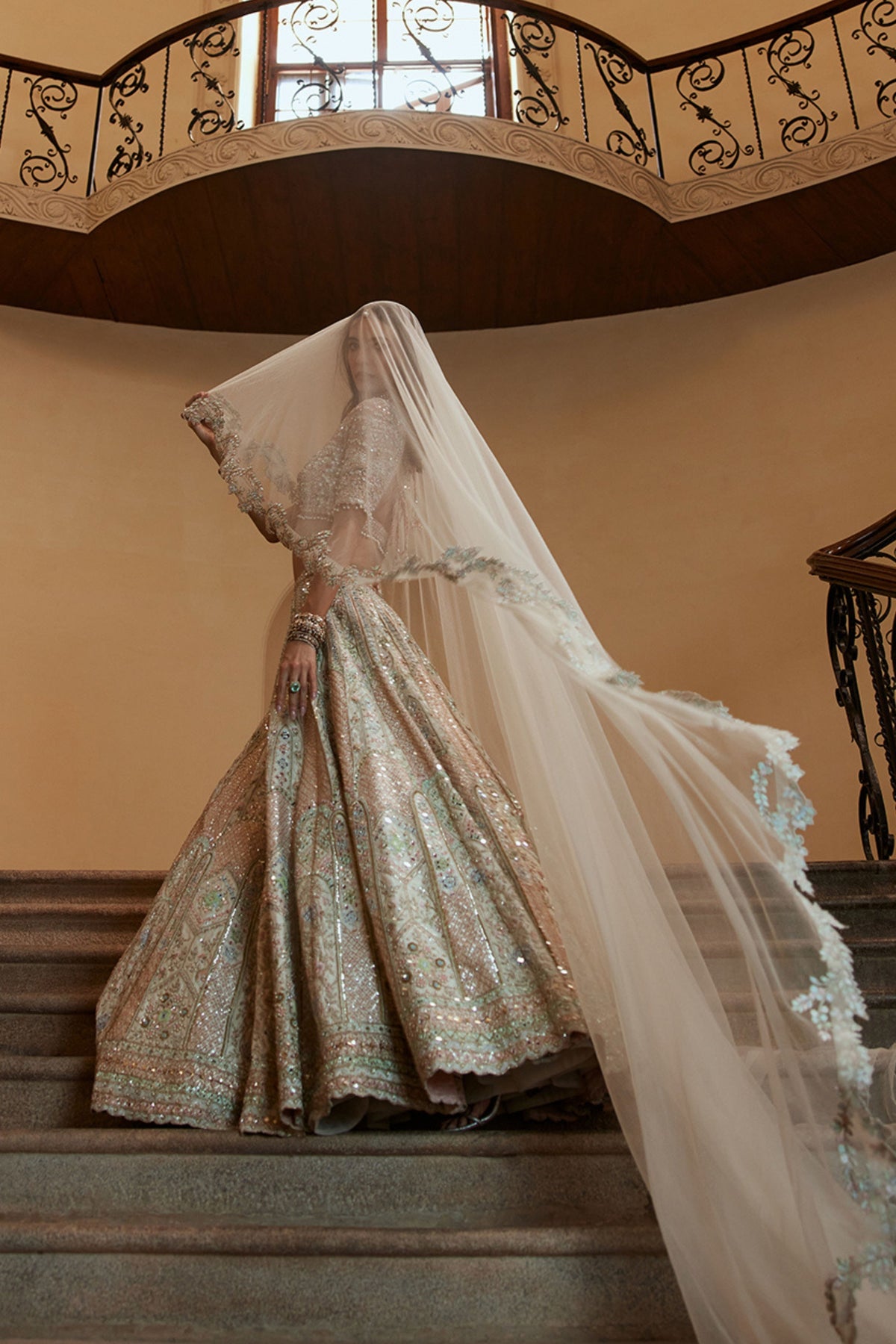 Ivory Lehenga With Multi Coloured Embroidery