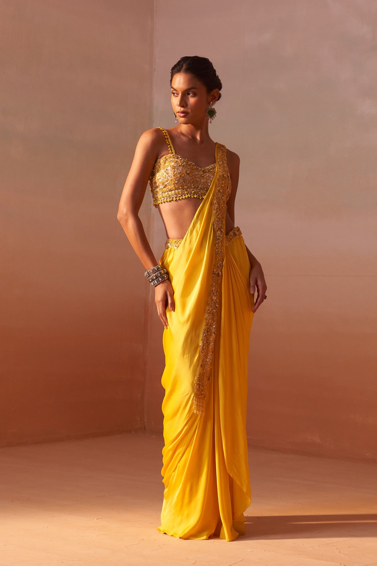 Yellow Draped Saree With Nude Choli