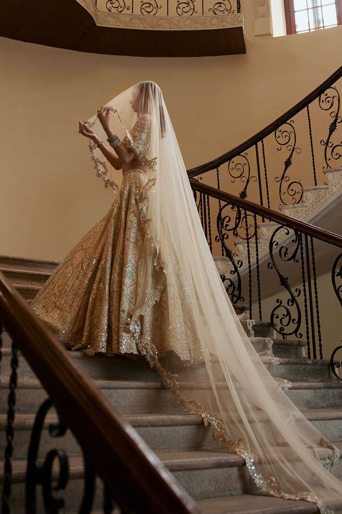 Ivory Lehenga With Multi Coloured Embroidery