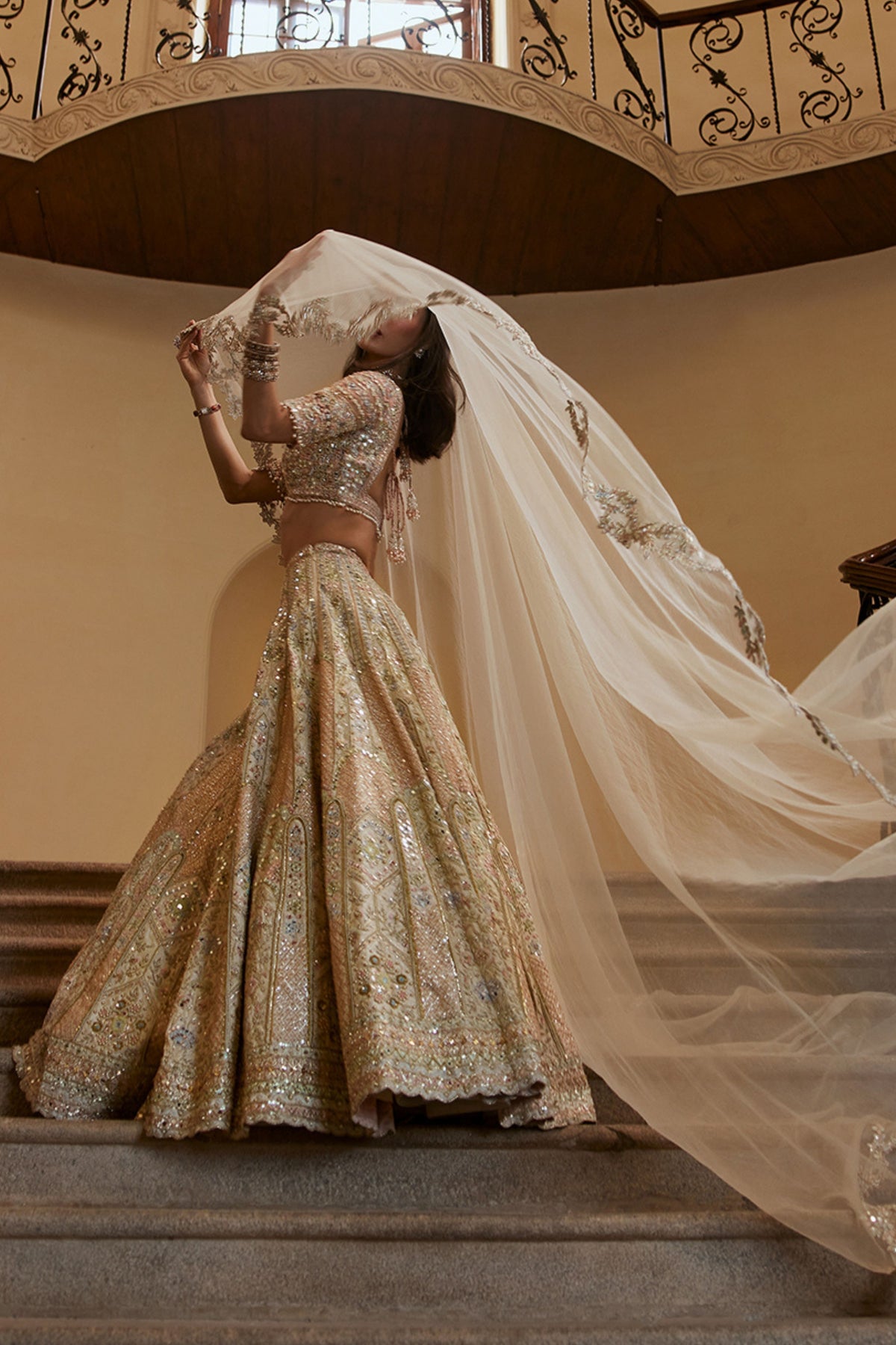 Ivory Lehenga With Multi Coloured Embroidery