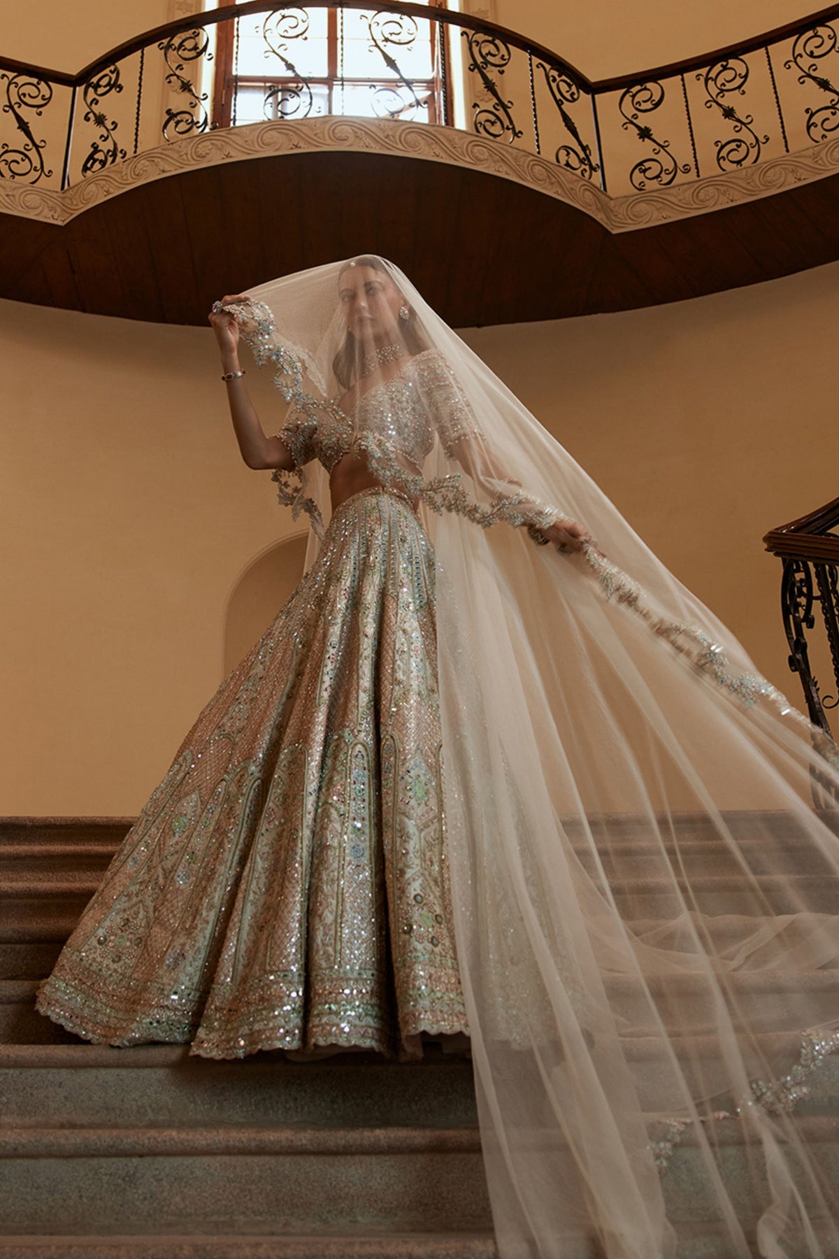 Ivory Lehenga With Multi Coloured Embroidery