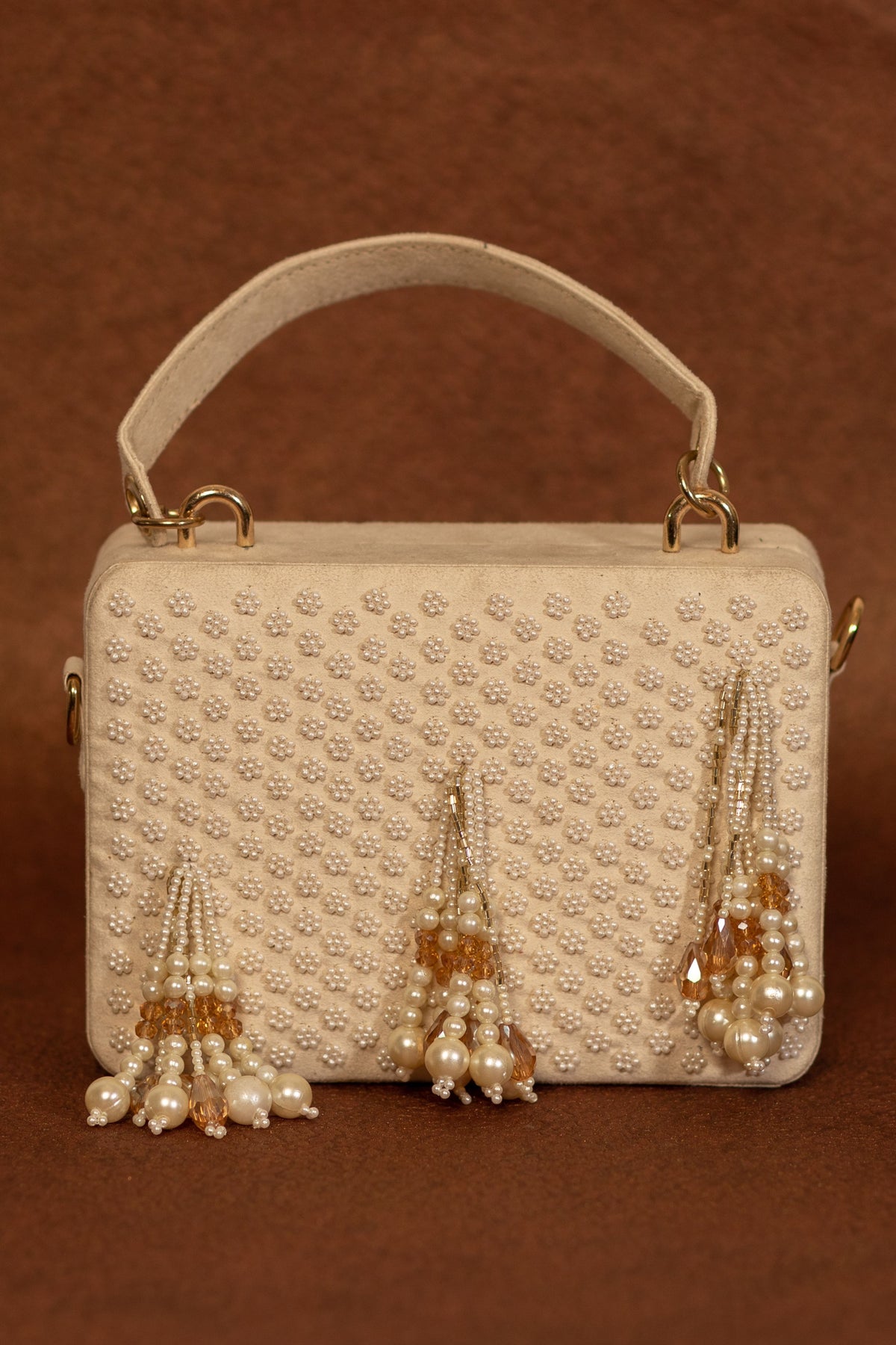 Dhoop cream clutch