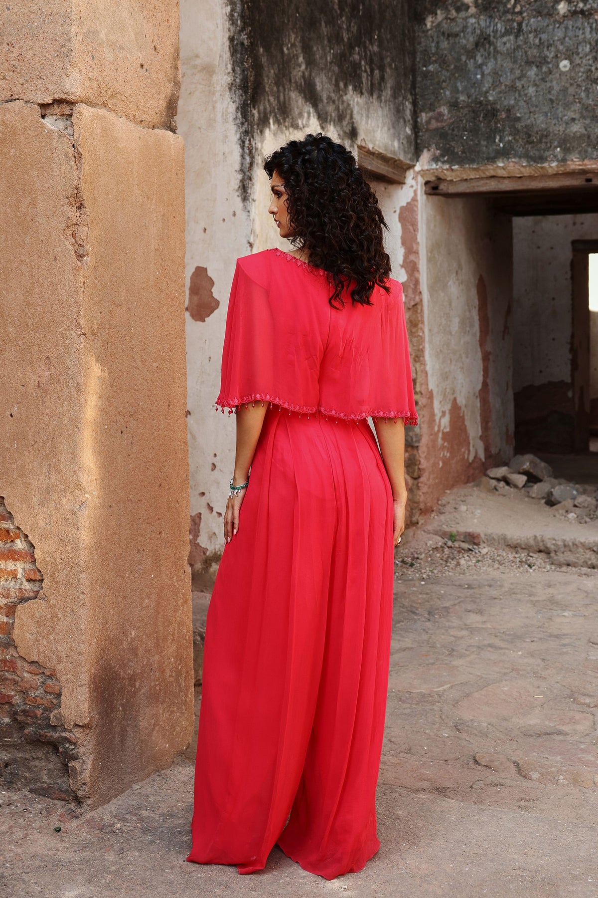 Niyati Pleated Jumpsuit in Coral Pink