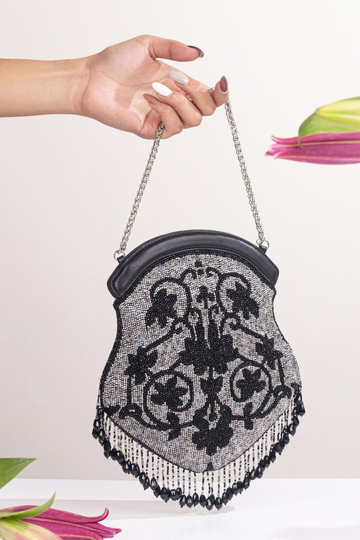 Orchid embellished potli bag