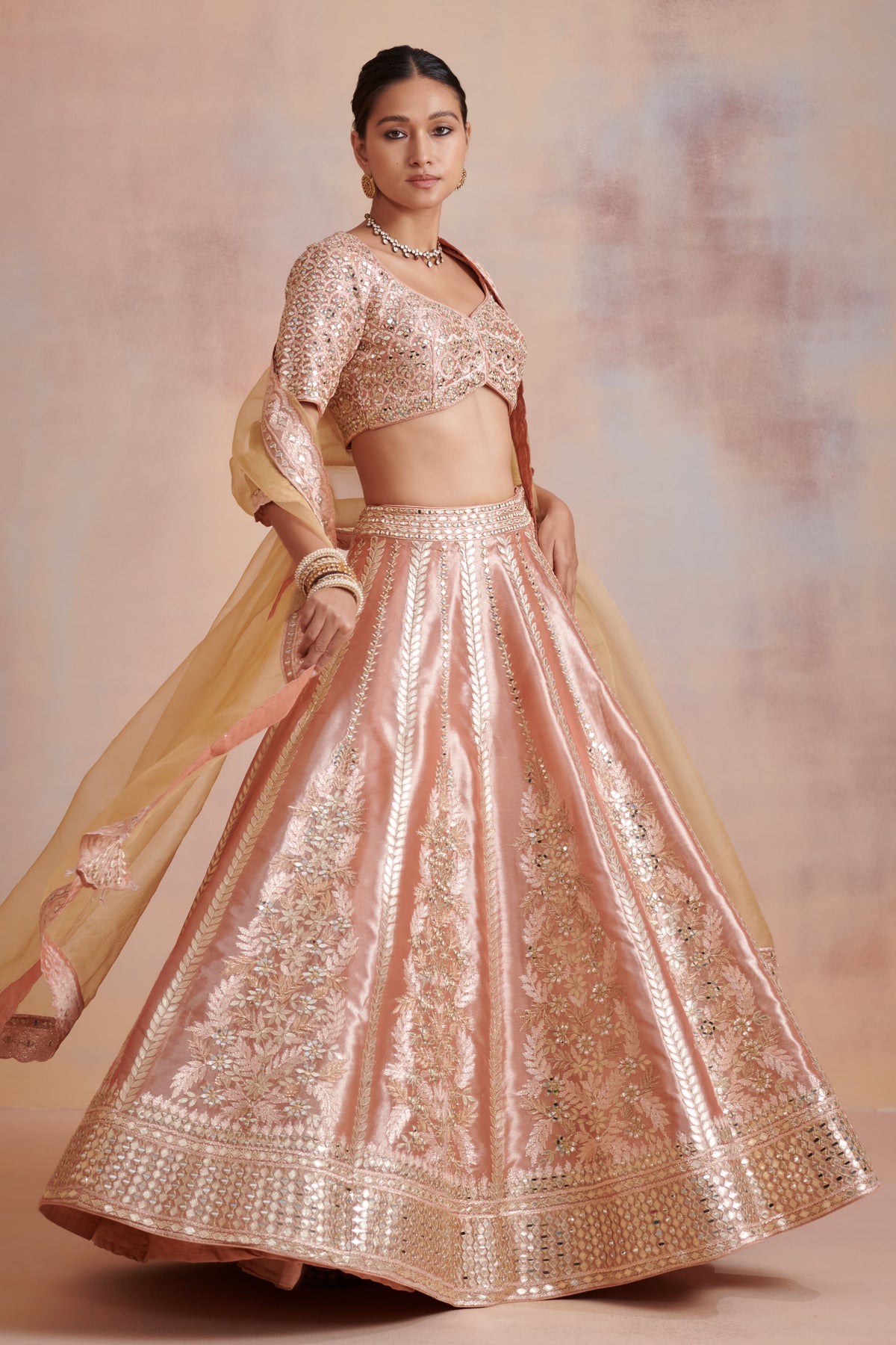 Melon orange tissue lehenga set