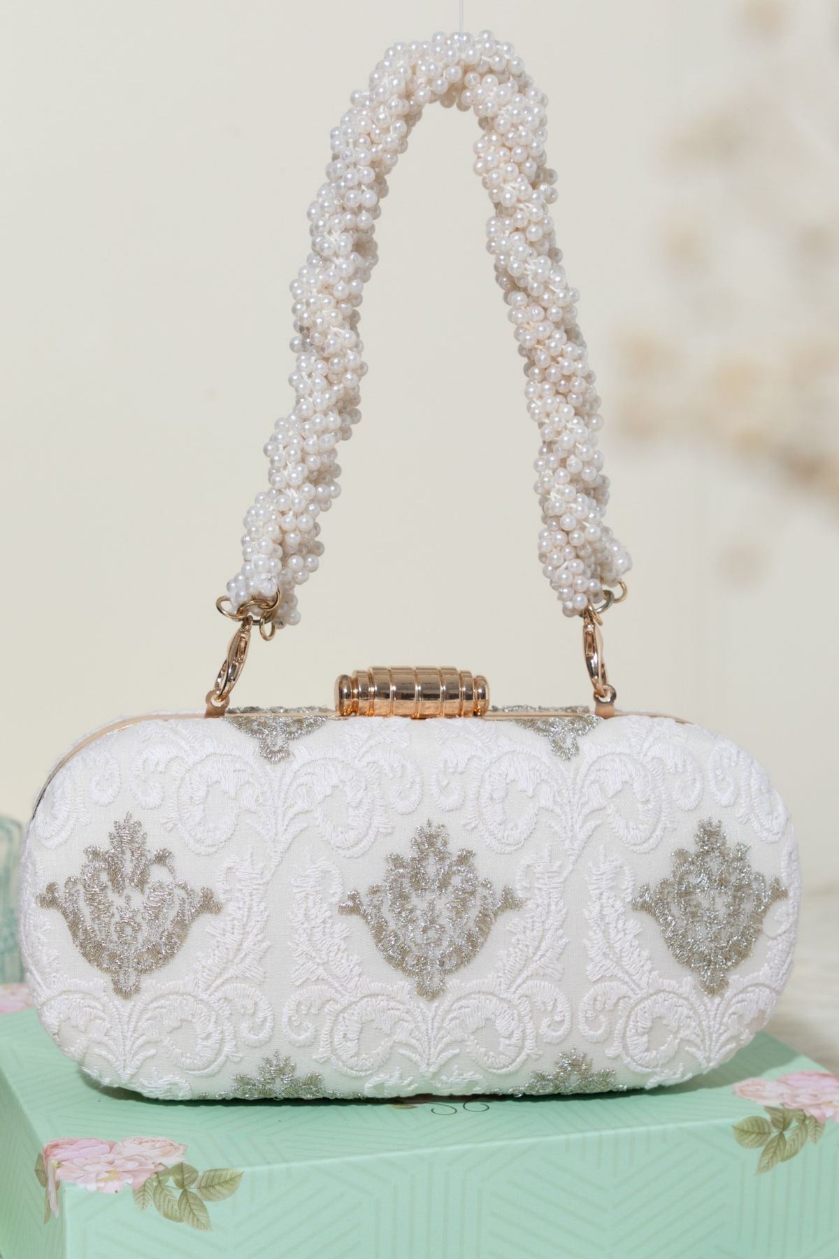 Eva Capsule White Clutch