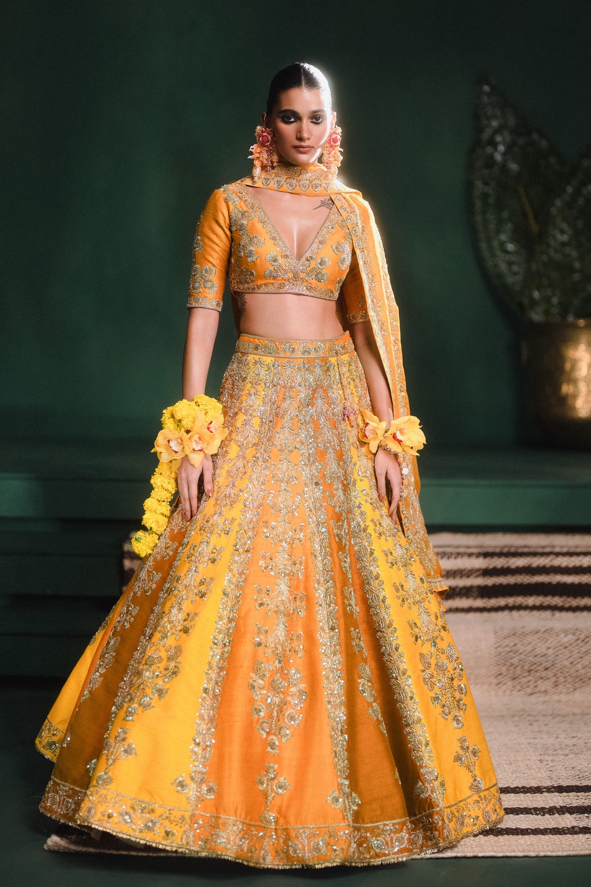 The Ghevar Ochre Lehenga Set