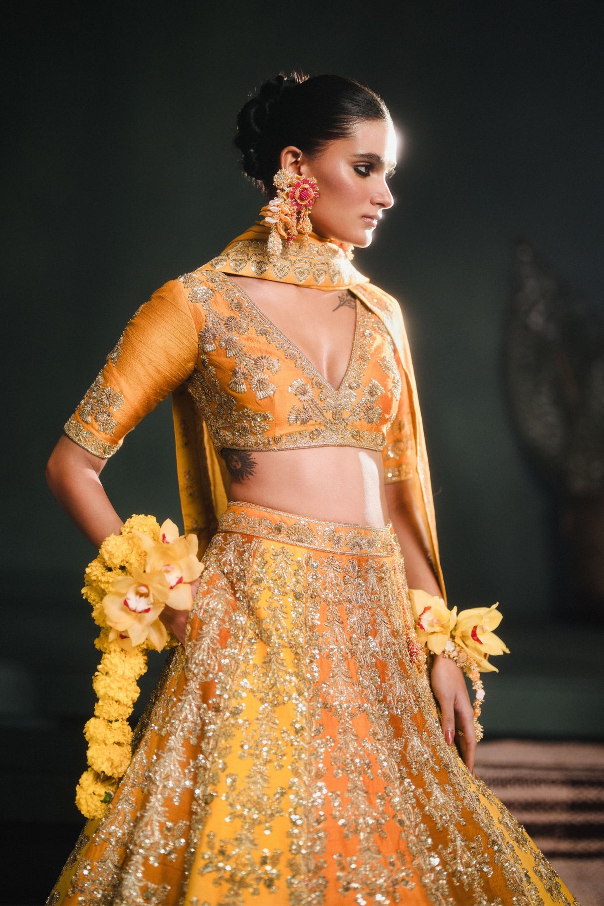 The Ghevar Ochre Lehenga Set