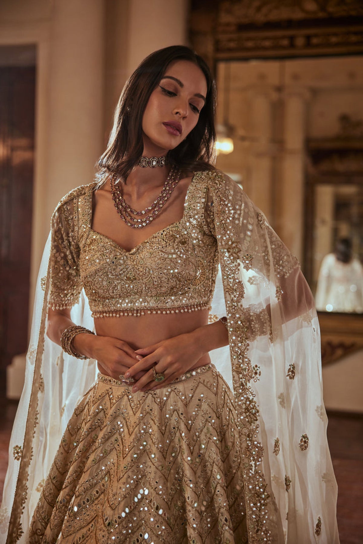 Cream Lehenga With Green Highlighting