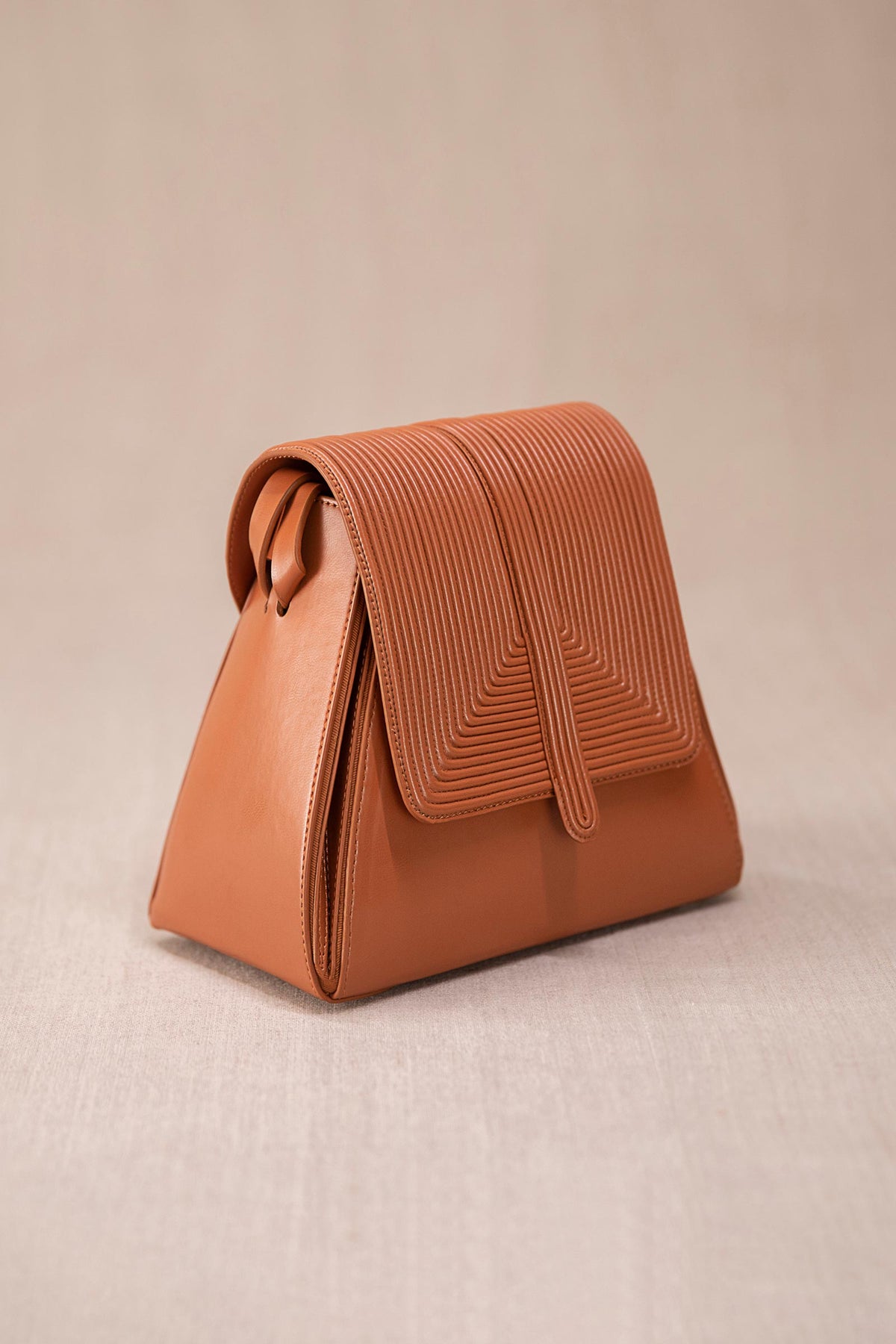 Tan naia shoulder bag