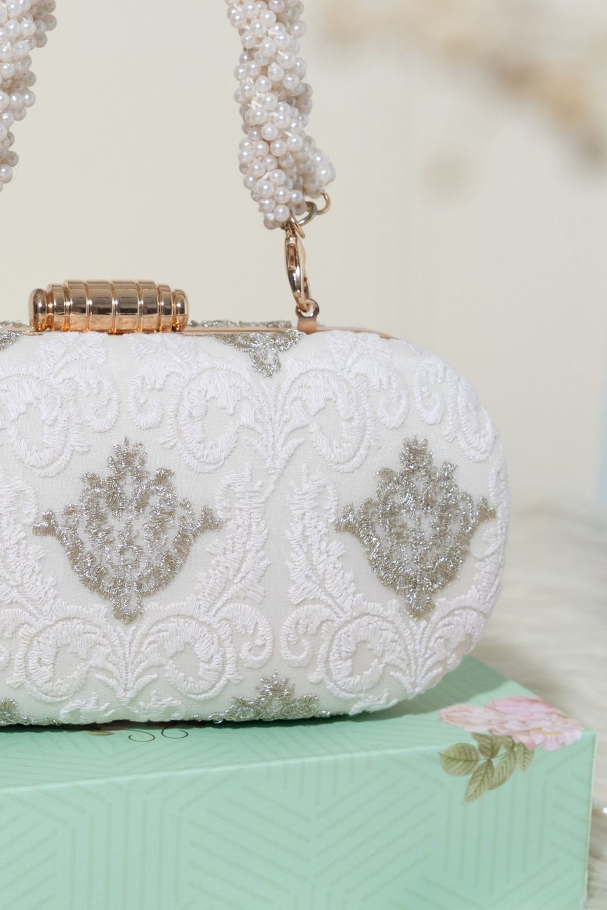 Eva Capsule White Clutch