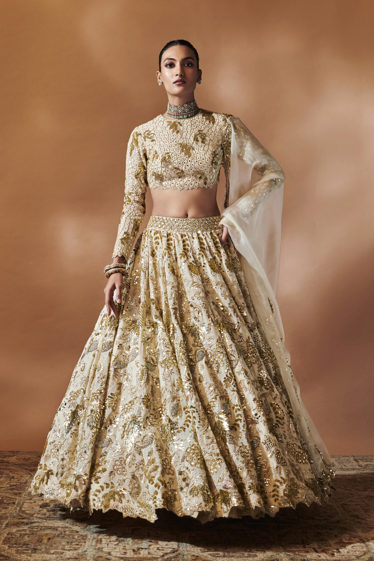 Ivory And Gold Heavily Embroidered Lehenga Set