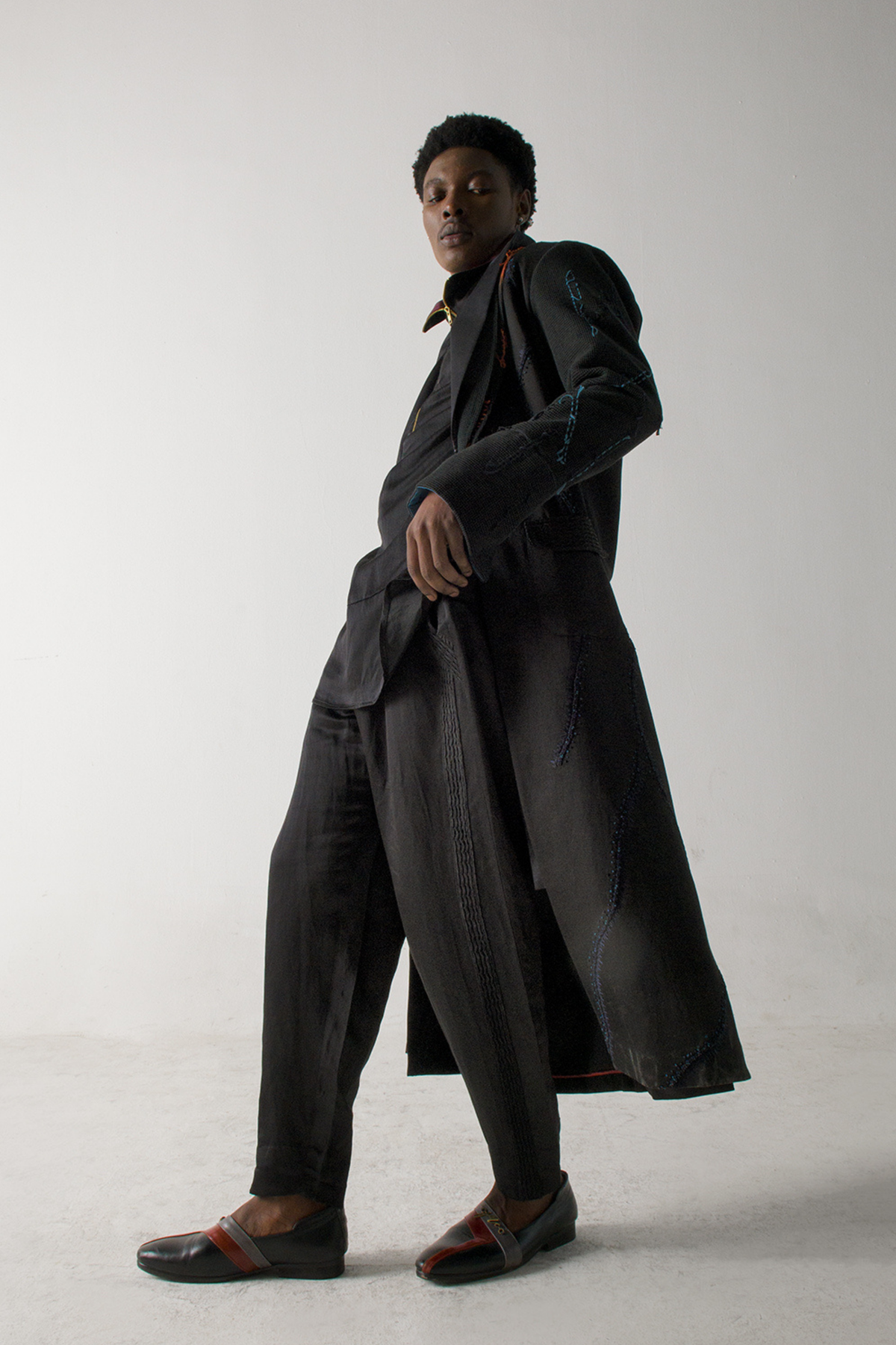 Black long overcoat with Loose Weave Sleeves