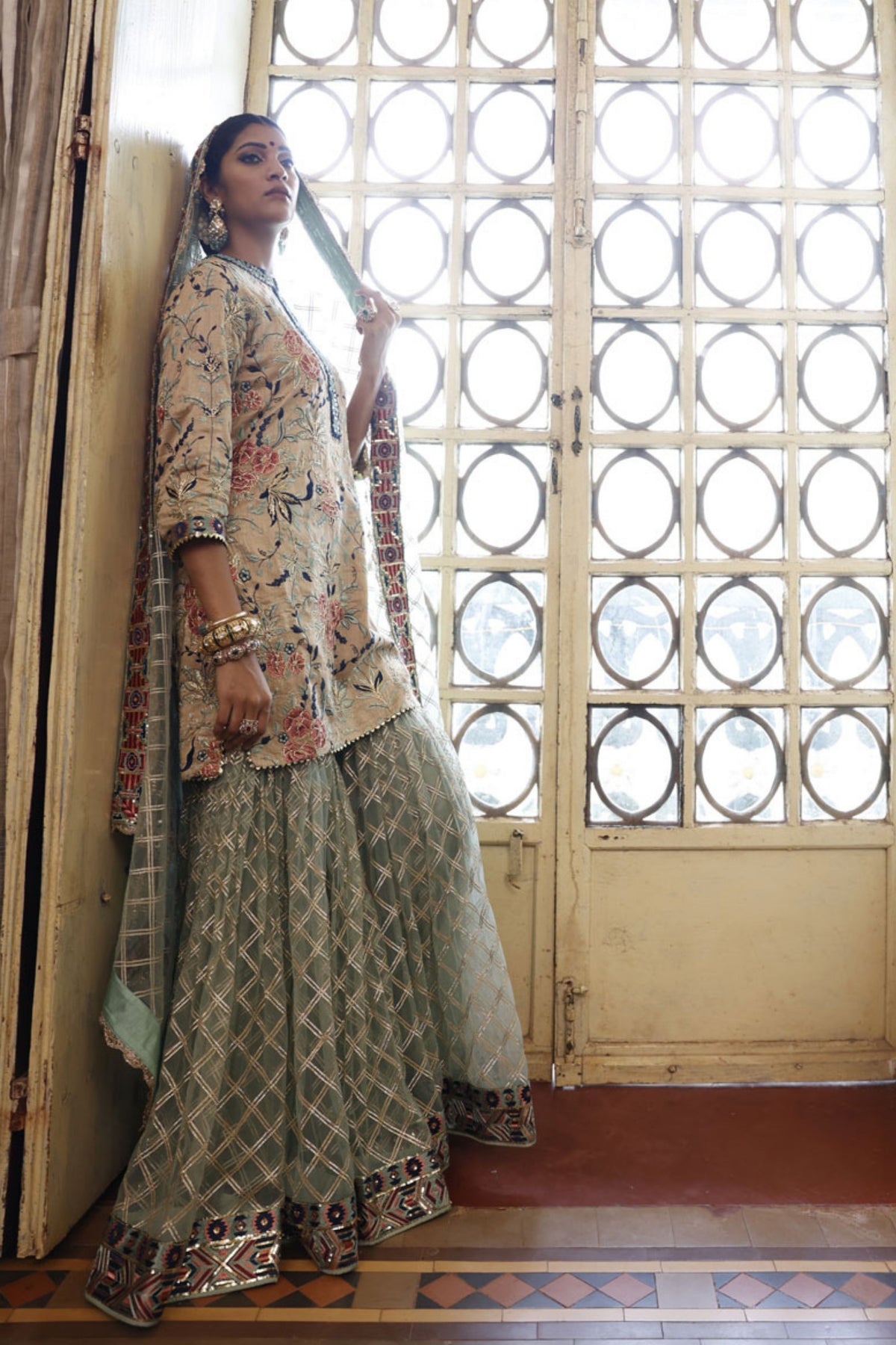 Beige Kurta with criss cross Sharara and Dupatta