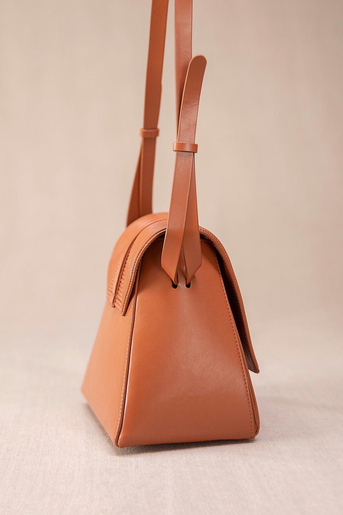 Tan naia shoulder bag