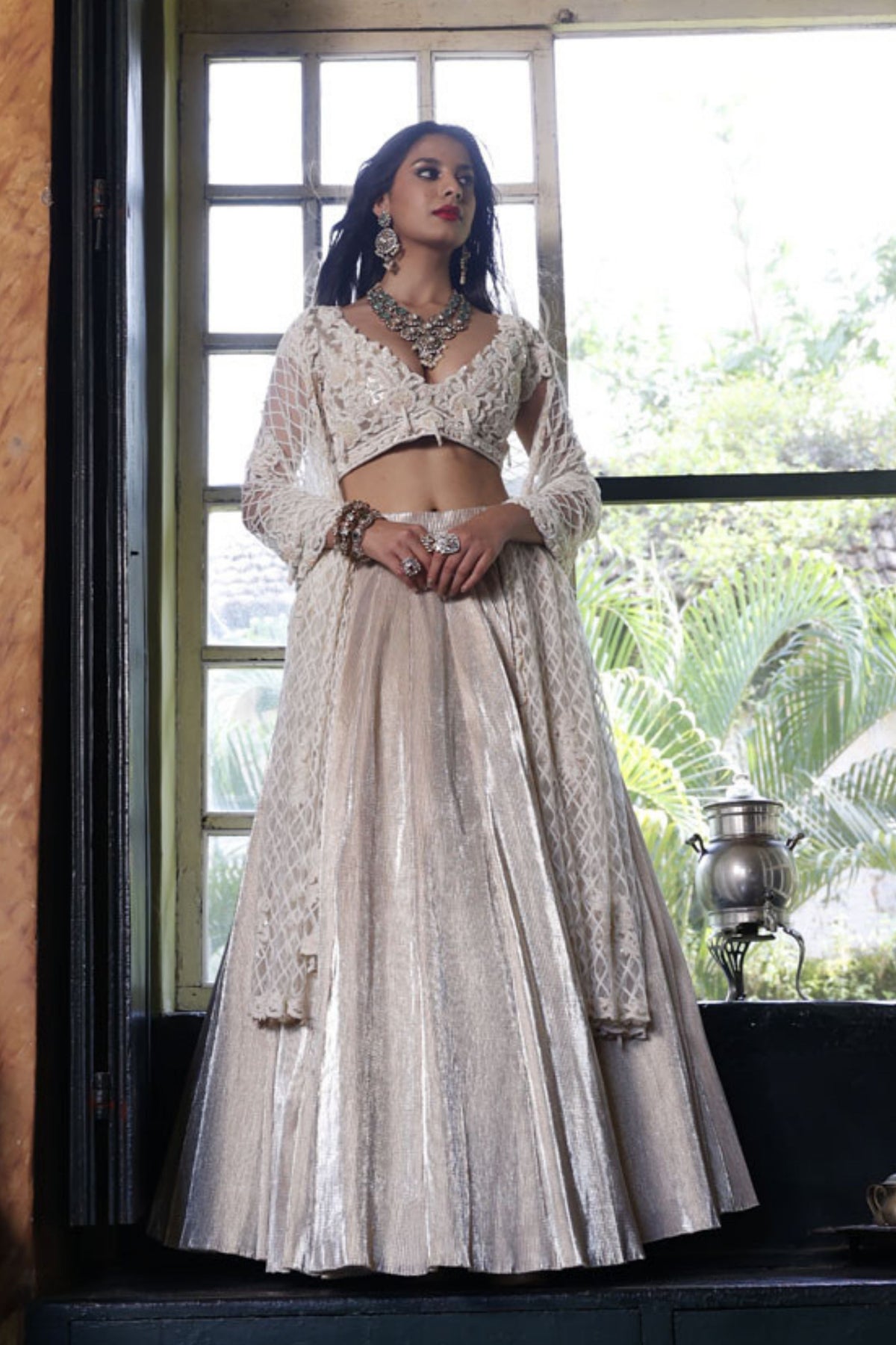 Ivory Pan Neck Cap Sleeves Choli with Ivory Pleated Lehenga Skirt with Net Dupatta