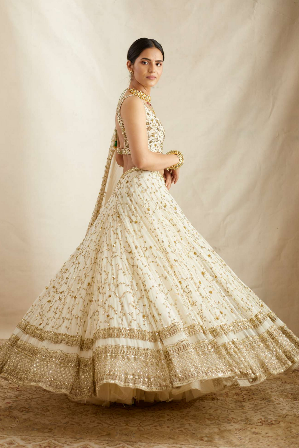 Off White Net Border Lehenga Set