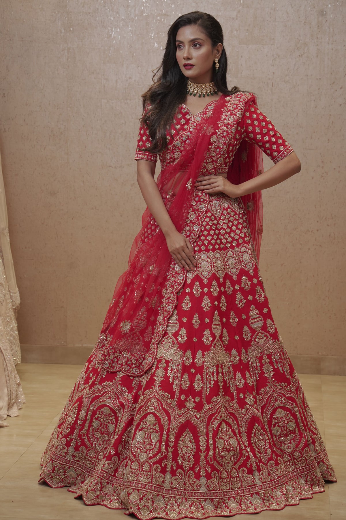 Beautifully Crafted Red Embellished Lehenga