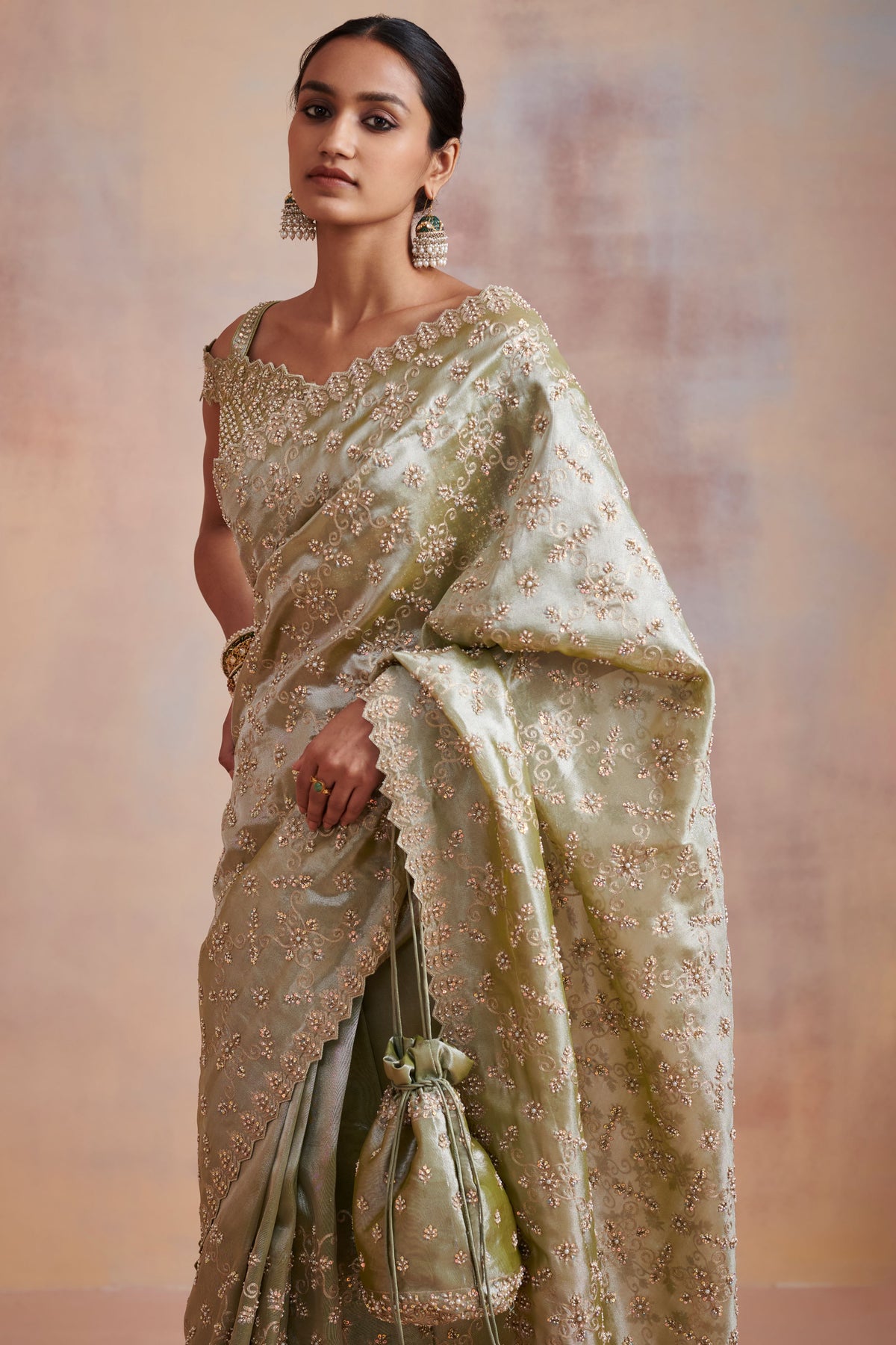 Moss green tissue saree