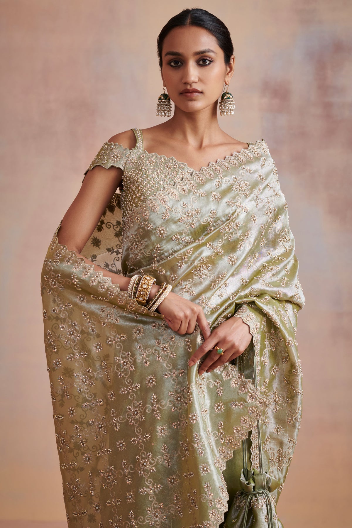 Moss green tissue saree