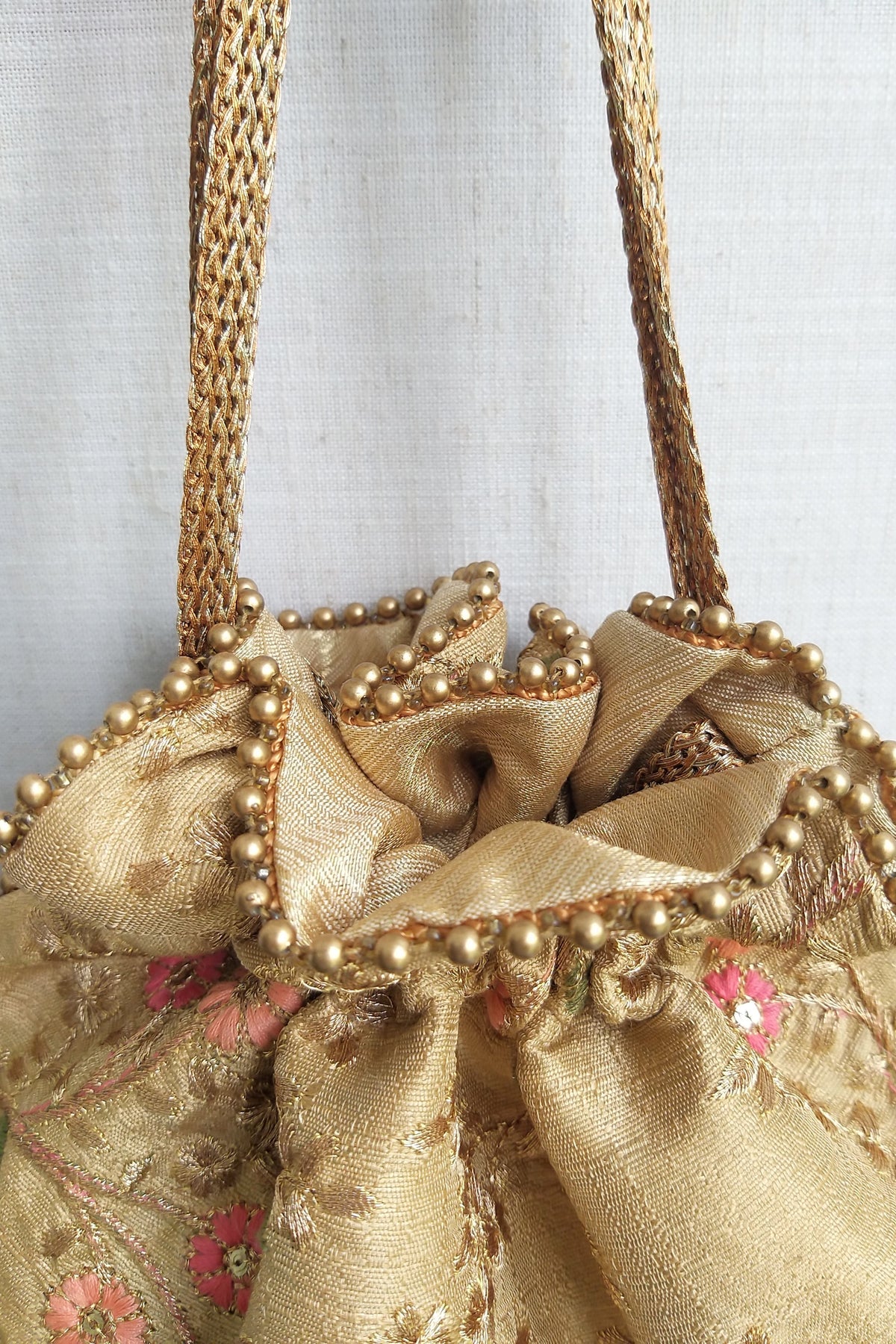 Floral Creeper Gold Potli Bag