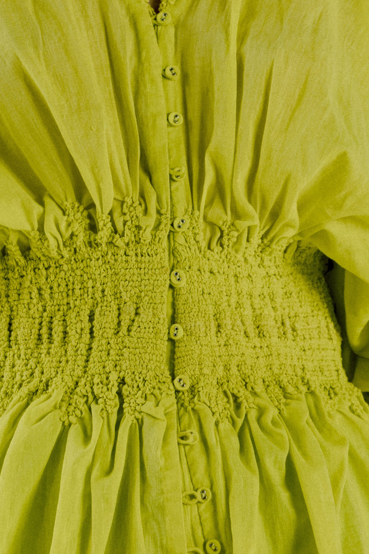 Neon yellow smocked waist top