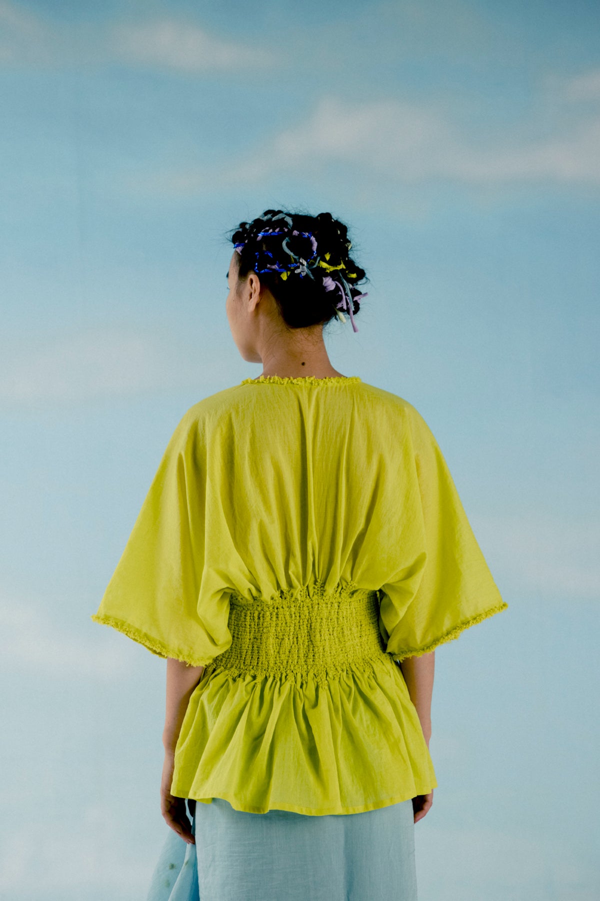 Neon yellow smocked waist top