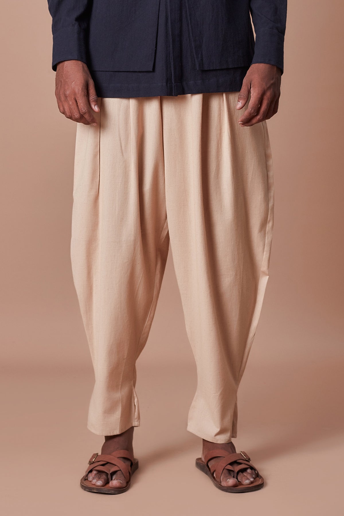 Beige pleated balloon pants