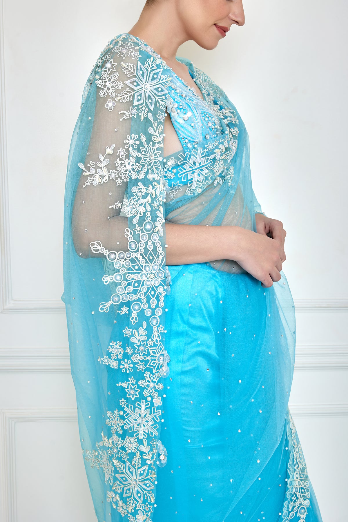 Vivid sky blue net sari