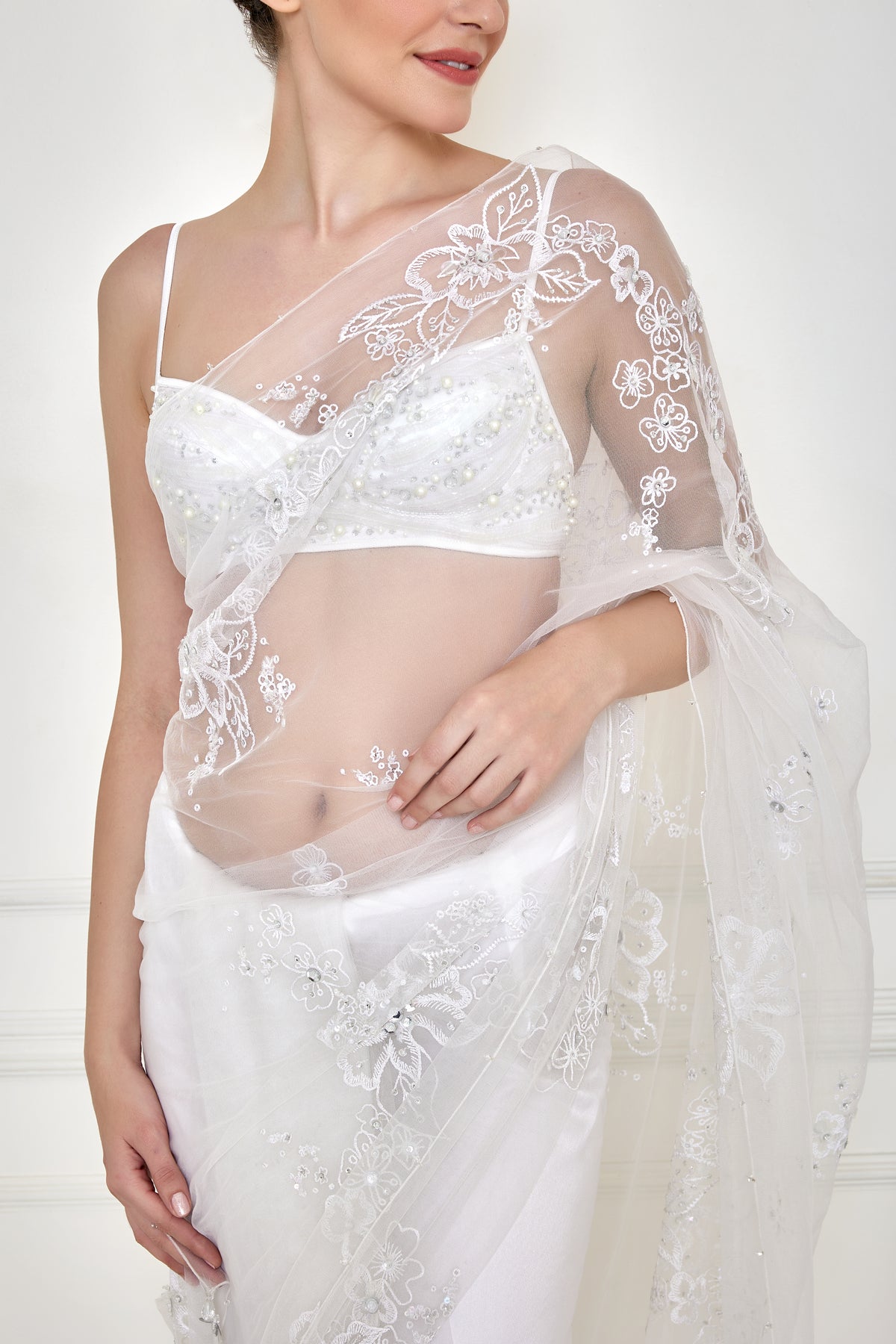 Frost white floral net sari