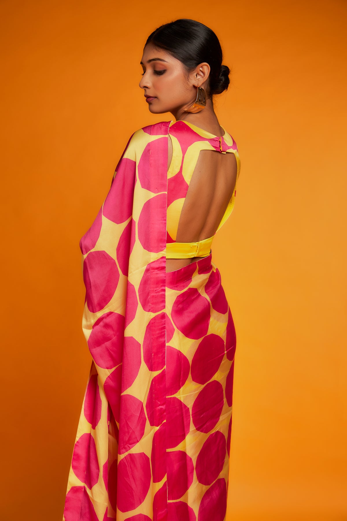 Pink yellow polka printed saree