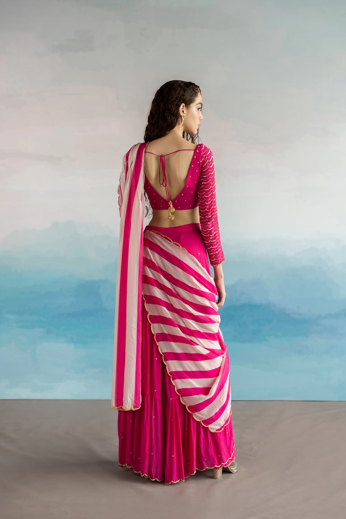 Rani Pink Striped Draped Saree